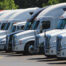 A row of trucks in a truck park