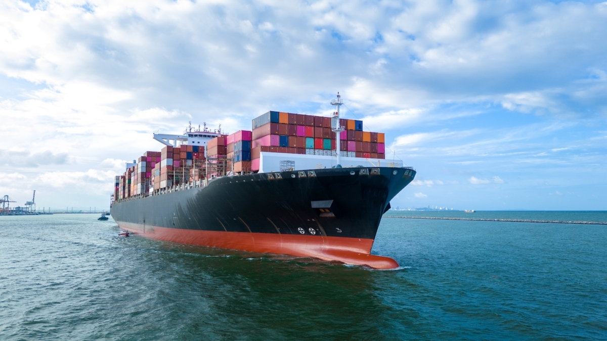 Aerial side view of cargo ship carrying container and running for export cargo yard port to custom ocean concept technology transportation , customs clearance, webinar banner forwarder mast